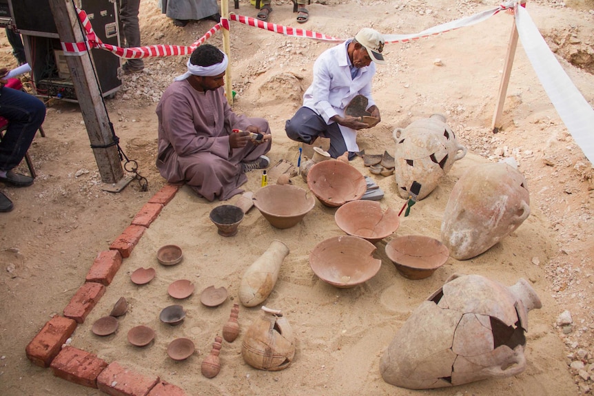 Mummy, intricately decorated pottery discovered in unexplored 3,500yo Egyptian tomb